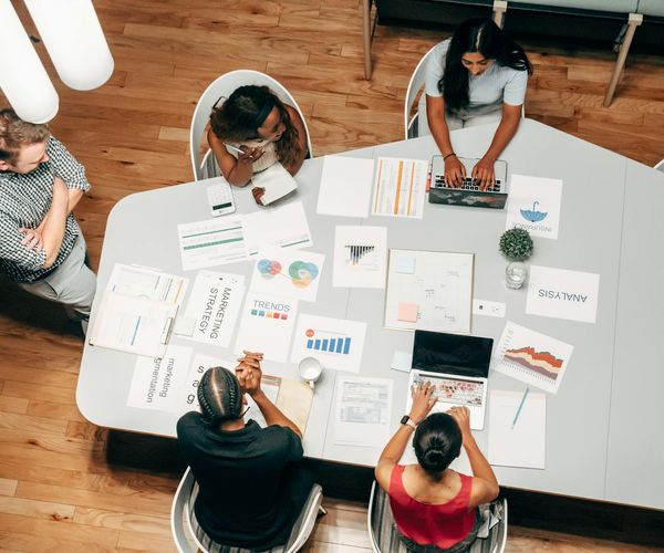 Professional team working on integrated marketing strategy